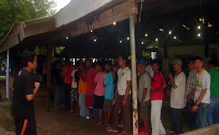 Day 1 - Participants fall in line for the first dinner of the week.