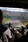 We're driving past the pergola, headed towards the vegetable garden.  We're sitting between Martha and Mike, the property manager.