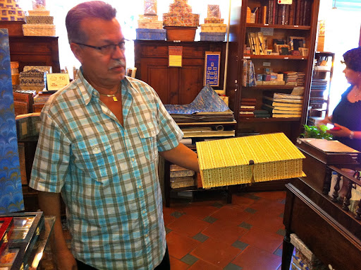 Owner John Leon showed me one of his most popular items, a beautiful box for storing wedding invitations, photos, or prized trickets.
