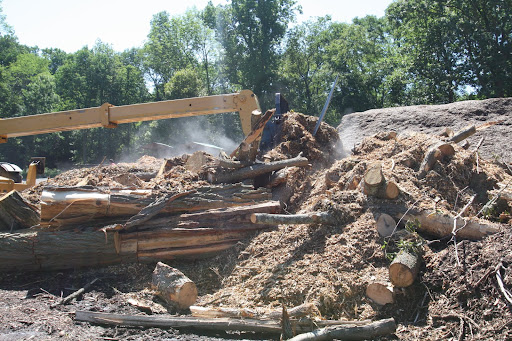 The grounds crew is taking all of the chopped wood and wood chips up to the composting yard.  No shortage of compost, that's for sure!