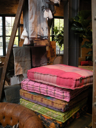 Bright square cushions beckon for lounging about.