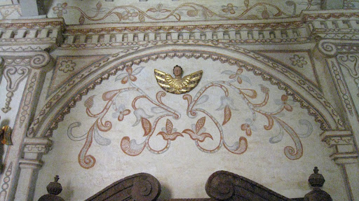 A gilded cherub.