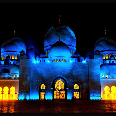 Sheikh Zayed Mosque in Abu Dhabi is the largest mosque in the United Arab Emirates and the sixth largest mosque in the world.It is named after Sheikh Zayed bin Sultan Al Nahyan, the founder and the first President of the United Arab Emirates, who is also buried there. The mosque was officially opened in the Islamic month of Ramadan in 2007.The design of the Sheikh Zayed Mosque has been inspired by Mughal and Moorish mosque architecture, the Badshahi Mosque in Lahore and the Hassan II Mosque in Casablanca being direct influences. The dome layout and floorplan of the mosque was inspired by the Badshahi Mosque and the architecture was inspired by both Mughal and Moorish design, particularly the Badshahi Mosque and the Hassan II Mosque. Its archways are quintessentially Moorish and its minarets classically Arab. The design of the mosque can be best described as a fusion of Arab, Mughal and Moorish architecture.The Mosque is large enough to accommodate 40,000 worshippers. The main praye 3731698053.jpg