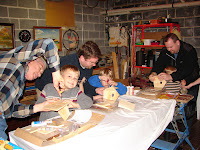 A fun Thanksgiving project in PopPop's (Jon's Dad) workshop building
bird houses