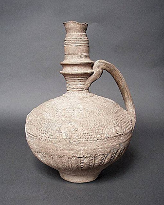 Large Ewer Greater Iran (Afghanistan) Large Ewer, 12th-14th century Ceramic; Vessel, Fritware, molded, Height: 12 1/4 in. (31 cm); Diameter: 7 1/2 in. (19 cm) Gift of Kate Fitz Gibbon and Andrew Hale (AC1997.253.3) Art of the Middle East: Islamic Department.