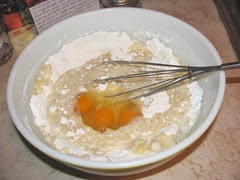 cran cardamon cake batter w eggs in bowl