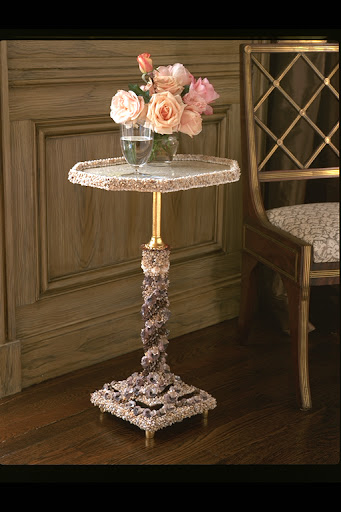 Small details make all the difference, as with this lovely end table encrusted with shells and small, delicate stones. Small details make all the difference, as with this lovely end table encrusted with shells and small, delicate stones.