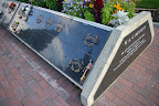 Plots for sale on one of W.A.C. Bennett's grave markers.