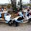 Lijiang - local women making embroidery