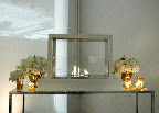 Gorgeous arrangements flanked the Taylor Creative fireplace in a lounge. Gorgeous arrangements flanked the Taylor Creative fireplace in a lounge.