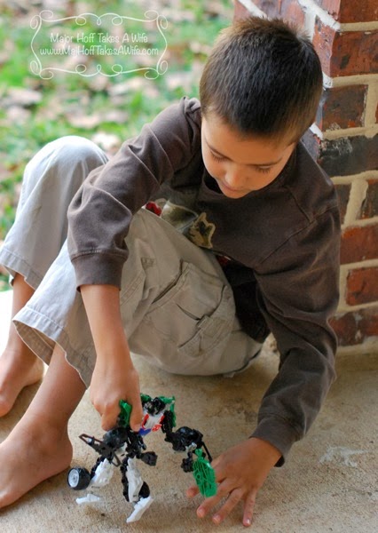 happy-boy-with-transformer-construct-bots.jpg Happy boy with transformer construct bots