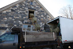 The conveyor was lowered and look how easy it makes getting those heavy bales up into the hay loft!  The chain has big hooks, which grip the bales for transport.11