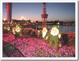 Florida vacation Epcot topiary 7 dwarfs at dusk