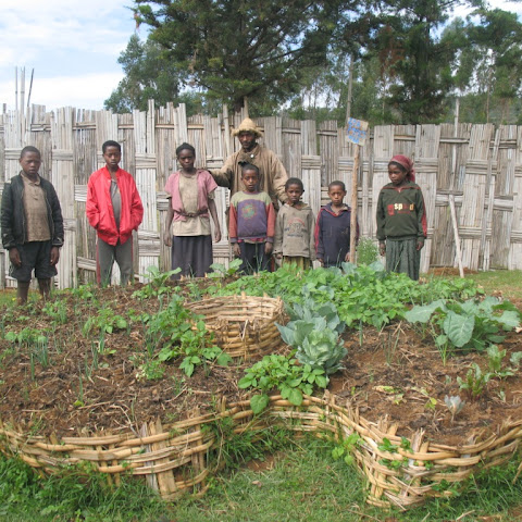 A weaved bamboo Keyhole garden. These gardens add nutritious vegetables to diets