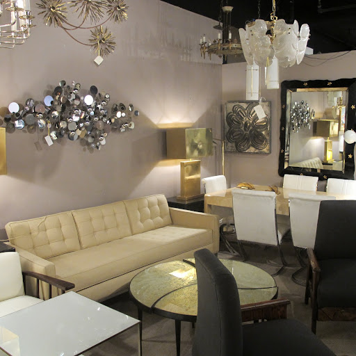 I like the neutral couch. This dealer's selection of lighting fixtures and wall art are especially great as well.