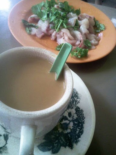 Good Sunday morning Just good old porridge with raw fish salad at Tanglin