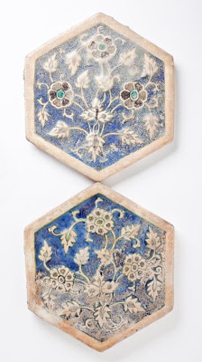 Tile | Origin: Greater Iran | Period: 14th-15th century | Collection: The Madina Collection of Islamic Art, gift of Camilla Chandler Frost (M.2002.1.261a-b) | Type: Ceramic; Architectural element, Fritware, molded and underglaze-painted, Diameter: 7 7/8 in. (20 cm); Depth: 9/16 in. (1.43 cm)