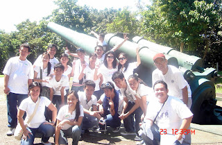 DACDT 2nd year class photo with old cannon as background