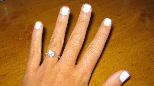 Clip nails to desired length, buff, and file into shape. Then apply two coats of your base color -- in your finished manicure, it'll be the shade that appears in the bottom left corner of your nails.