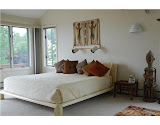 Master bedroom, with view of the Sakonnet Master bedroom, with view of the Sakonnet