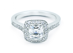 The Tiffany Legacy features a cushion modified brilliant cut diamond in a lavish diamond-encrusted setting. We adore its vintage feel. The Tiffany Legacy features a cushion modified brilliant cut diamond in a lavish diamond-encrusted setting. We adore its vintage feel.