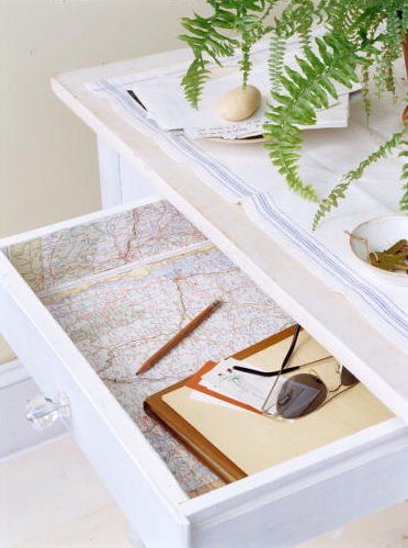 Maps inside of a drawer is an unexpected detail. (Martha Stewart Living, August 2002)