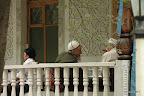 Old men drinking tea