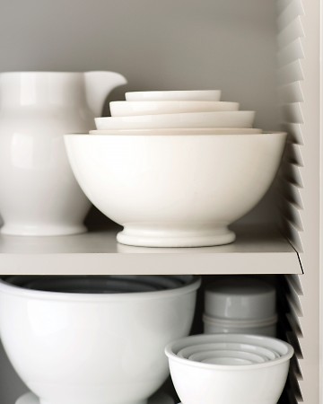 Martha considered every corner of her kitchen in, right down to the shelving supports. She went with 'bird's beak' supports so there are no holes, no hardware and the look is streamlined. Martha considered every corner of her kitchen in, right down to the shelving supports. She went with 'bird's beak' supports so there are no holes, no hardware and the look is streamlined.