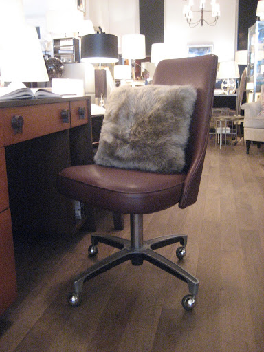 Mid-century swivel chair with faux pillow. Mid-century swivel chair with faux pillow.