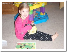 Minnie (3 years) playing Nocturnal Farm Animals Game