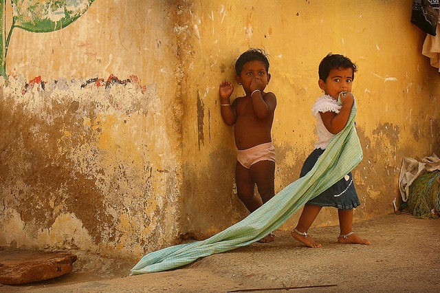 [-indian-children-near-yellow-wall-in-the-village-of-kanyakumari-anastasiia-kononenko%255B4%255D.jpg]