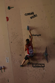 Katy Whittaker competing in the IFSC Bouldering World Cup.