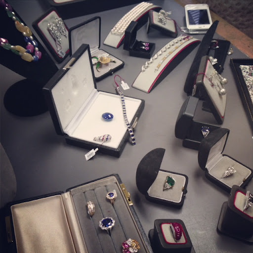 After watching craftsmen at work designing and setting jewelry, we were treated to a small sample of finished products. (And, yes, we pretty much tried everything on!) After watching craftsmen at work designing and setting jewelry, we were treated to a small sample of finished products. (And, yes, we pretty much tried everything on!)