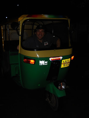 Kenny's taking up a second job... moonlighting as a rickshaw driver