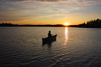 Canoeing into the sunset in Obatanga Provincial Park
