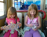 Lily keeps Emma laughing with nonsense and infectuous giggle.