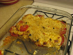 A half-eaten tomato bake. A half-eaten tomato bake.