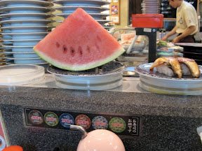 Mobile Watermelon and unagi at a kaiten-zushi.