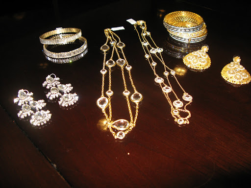 Jewelry from Jennifer Miller, earrings on the left from J.Crew.