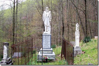 Devil Anse Hatfield's grave stone and statue in Hatfield Cemetery