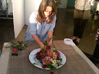 Livia, from The Green Vase, builds a bouquet.