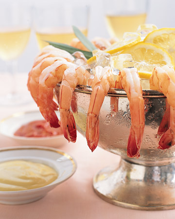 Shrimp Cocktail: Arrange shrimp along the rim of an ice-filled bowl (or on a platter) accompanied by lemon slices and cocktail sauce or lemon aioli. Shrimp Cocktail: Arrange shrimp along the rim of an ice-filled bowl (or on a platter) accompanied by lemon slices and cocktail sauce or lemon aioli.