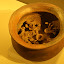 Vessels depicting scenes of dancers wearing hair-raising masks showing prominent fangs and enormous jaws represented temples transformed into primordial micro-cosmoses.