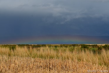 low hanging rainbow over Summer Lake Refuge