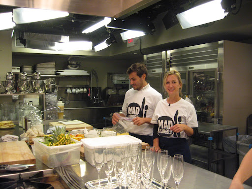Sarah and Thomas preparing food for the show