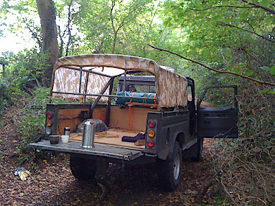 The Defender stopped in a small grove of trees, a footpath up to the fields to the right, a great spot to watch out for deer grazing in the fields.
