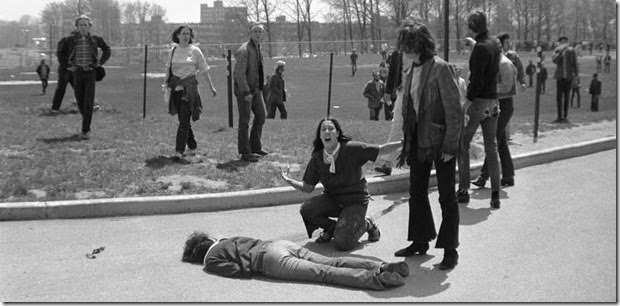 Mary Ann Vecchio screams as she kneels over the body of fellow student Jeffrey Miller during an anti-war demonstration at Kent State University, Ohio, May 4, 1970. Four students were killed when Ohio National Guard troops fired at some 600 anti-war demonstrators. A cropped version of this image won the Pulitzer Prize. 