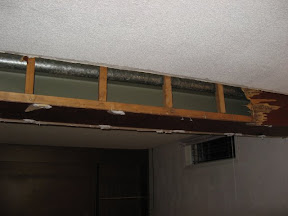 The roof gutters routed through pipes in the ceiling to a drain.  Apparently this was normal for the neighbourhood.
