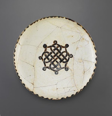 Bowl | Origin:  Iran or Afghanistan | Period: 10th century  Samanid period | Details:  Not Available | Type: Earthenware painted over transparent glaze | Size: W: 32.4  cm | Museum Code: F1953.70 | Photograph and description taken from Freer and the Sackler (Smithsonian) Museums.