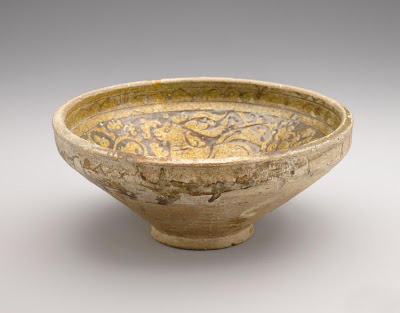 Bowl | Origin:  Garrus district,  Iran | Period: 12th-13th century | Details:  Not Available | Type: Earthenware with decoration carved through a white slip and coloring under a transparent glaze | Size: H: 10.9  W: 25.2  cm | Museum Code: F1925.8 | Photograph and description taken from Freer and the Sackler (Smithsonian) Museums.